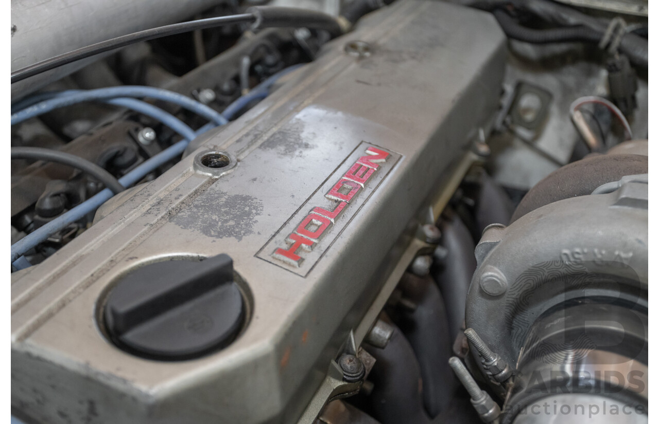 6/1988 Holden VL Commodore Executive 4d Sedan Pastel Pink Turbo 3.0L