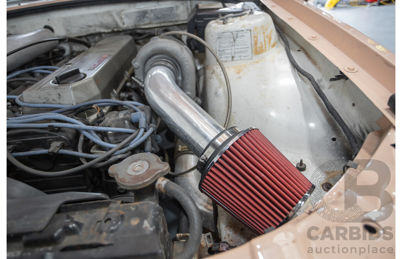 6/1988 Holden VL Commodore Executive 4d Sedan Pastel Pink Turbo 3.0L