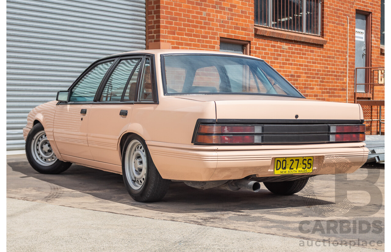 6/1988 Holden VL Commodore Executive 4d Sedan Pastel Pink Turbo 3.0L