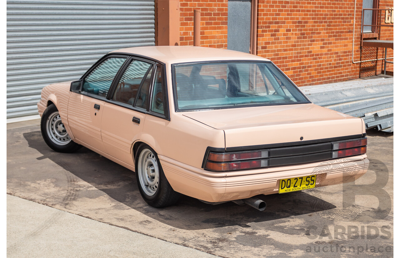 6/1988 Holden VL Commodore Executive 4d Sedan Pastel Pink Turbo 3.0L