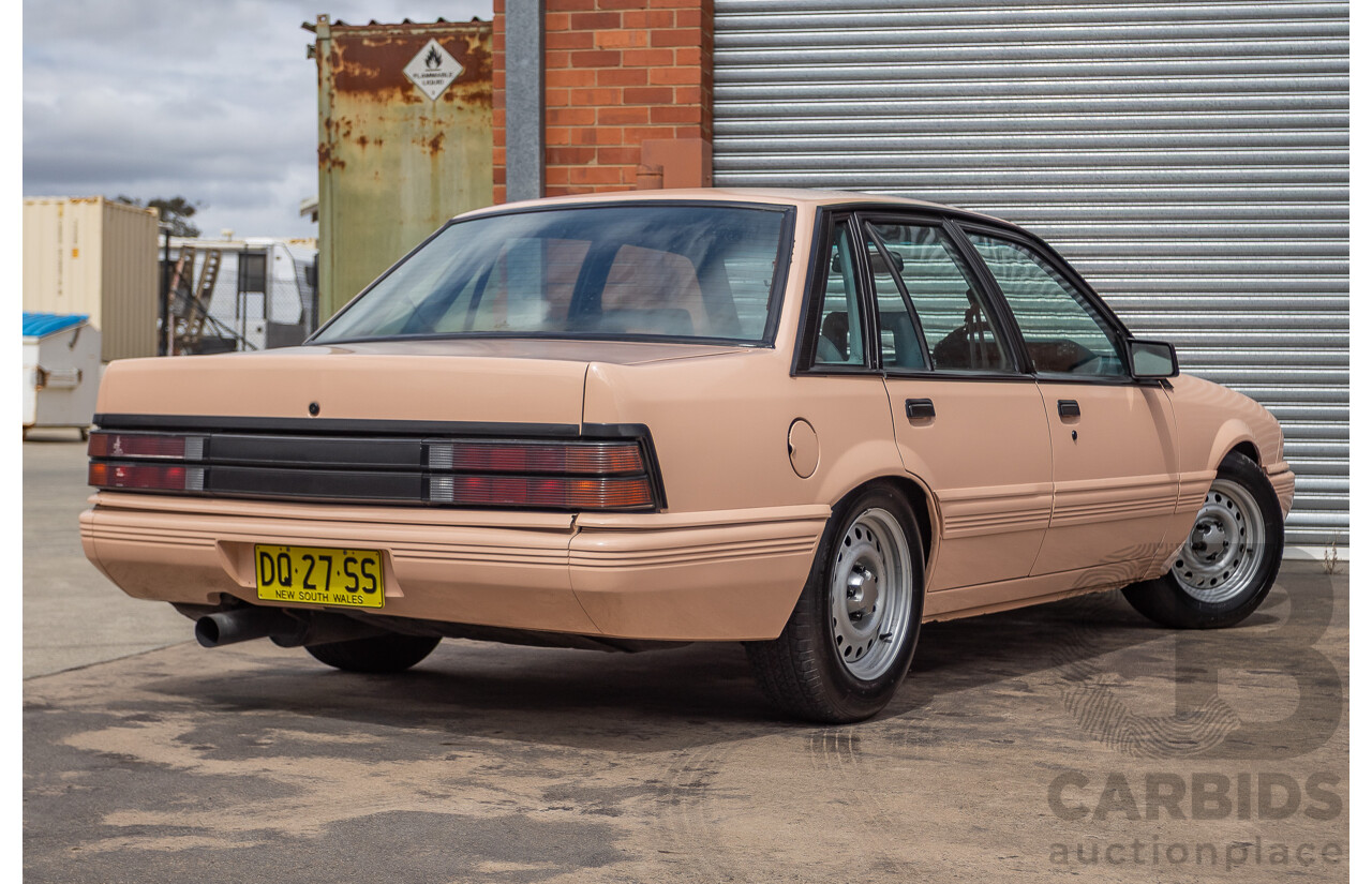 6/1988 Holden VL Commodore Executive 4d Sedan Pastel Pink Turbo 3.0L