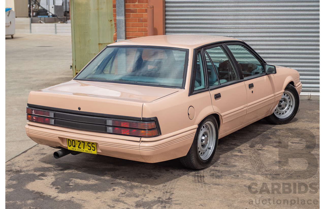 6/1988 Holden VL Commodore Executive 4d Sedan Pastel Pink Turbo 3.0L