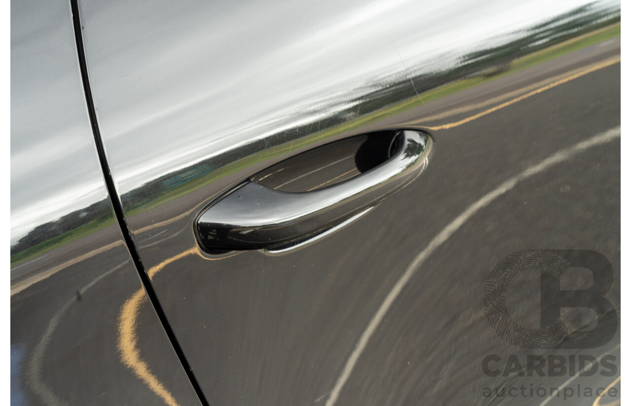 07/2016 Porsche Macan Turbo (AWD) MY16 4d Wagon Jet Black Metallic Twin Turbo V6 3.6L