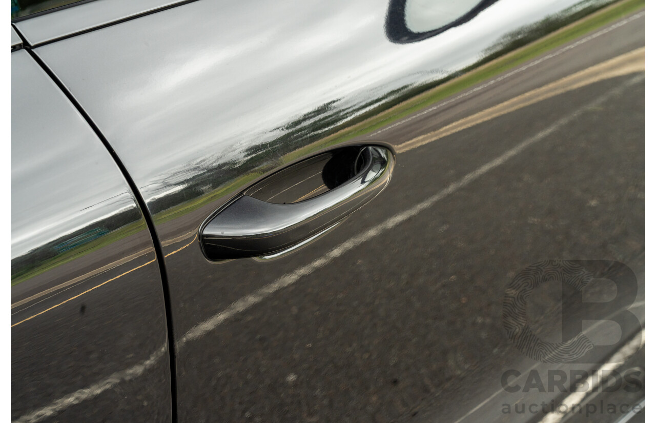 07/2016 Porsche Macan Turbo (AWD) MY16 4d Wagon Jet Black Metallic Twin Turbo V6 3.6L