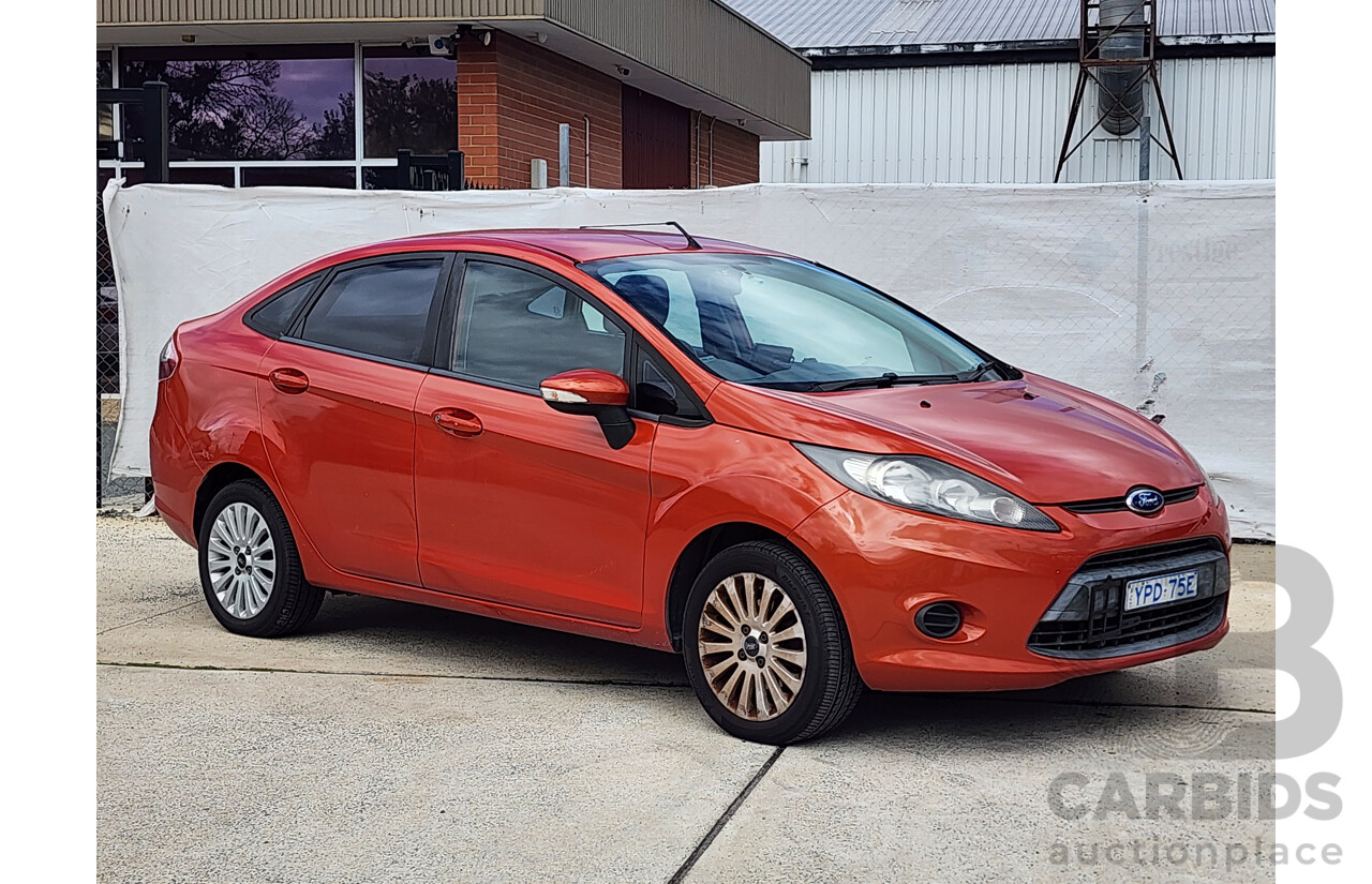 10/2010 Ford Fiesta LX WT 4d Sedan Orange 1.6L
