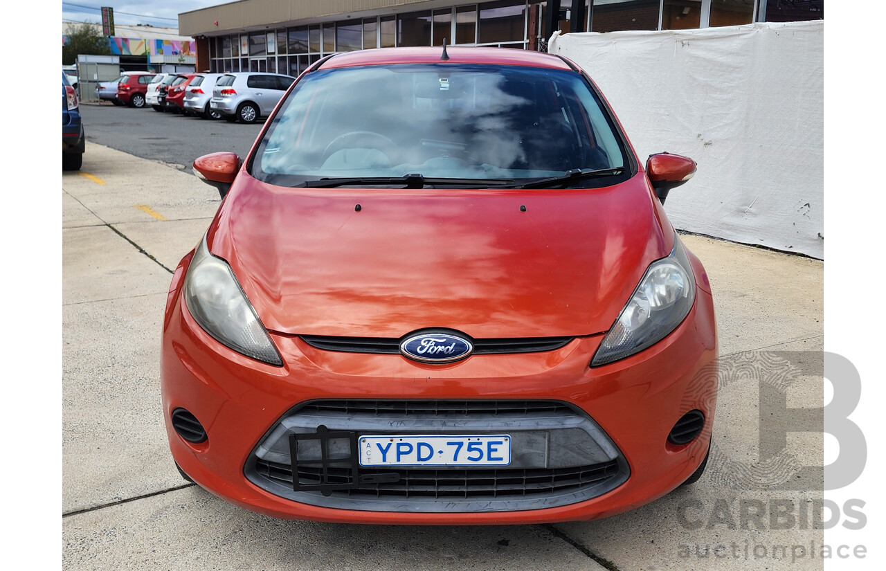 10/2010 Ford Fiesta LX WT 4d Sedan Orange 1.6L