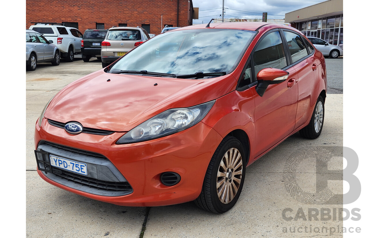 10/2010 Ford Fiesta LX WT 4d Sedan Orange 1.6L