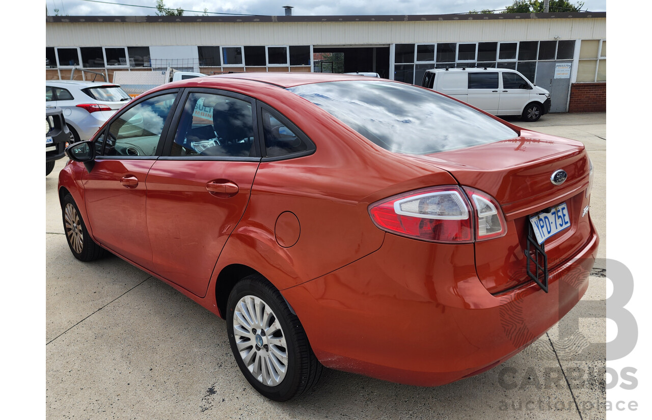 10/2010 Ford Fiesta LX WT 4d Sedan Orange 1.6L