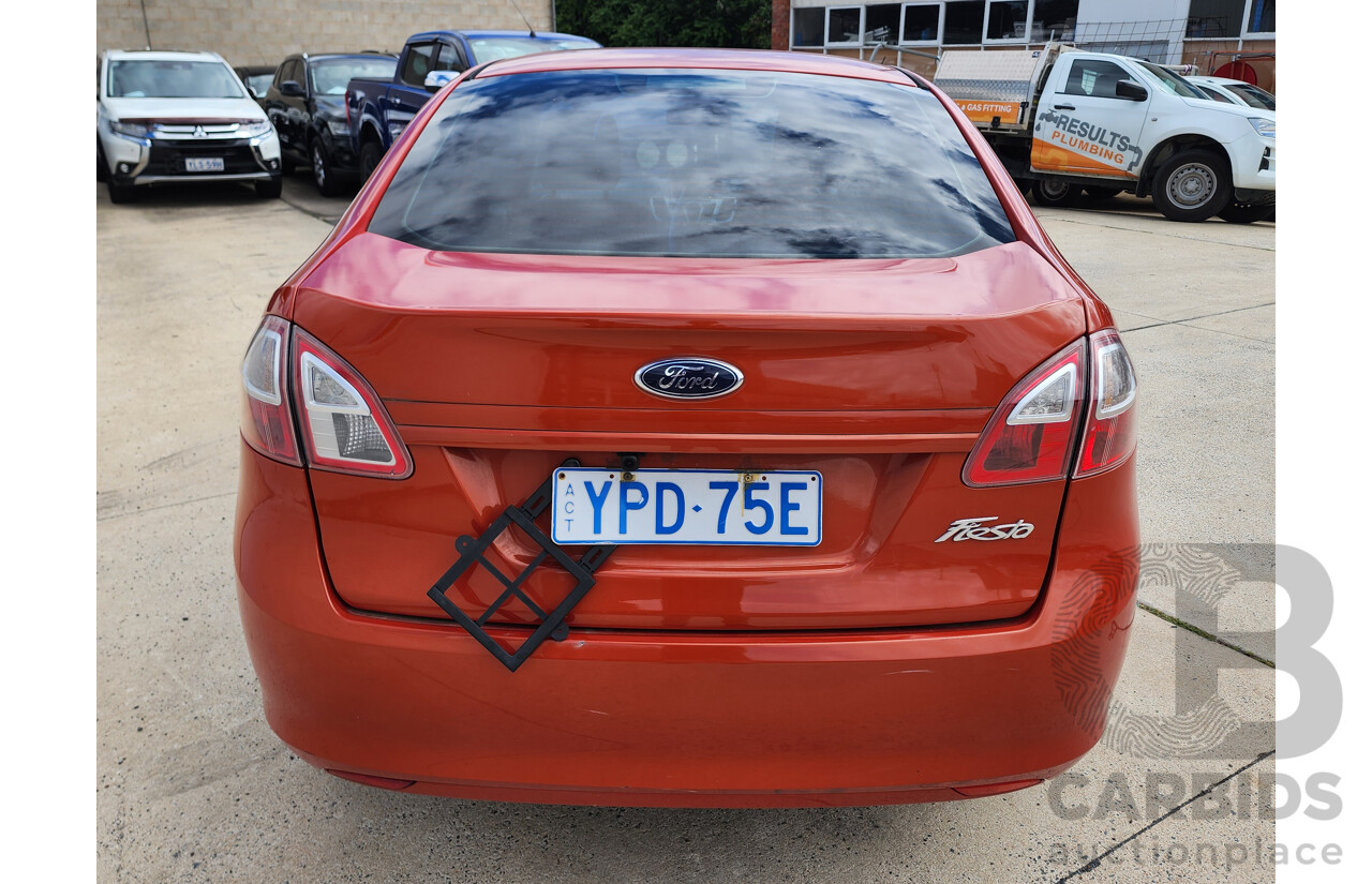 10/2010 Ford Fiesta LX WT 4d Sedan Orange 1.6L
