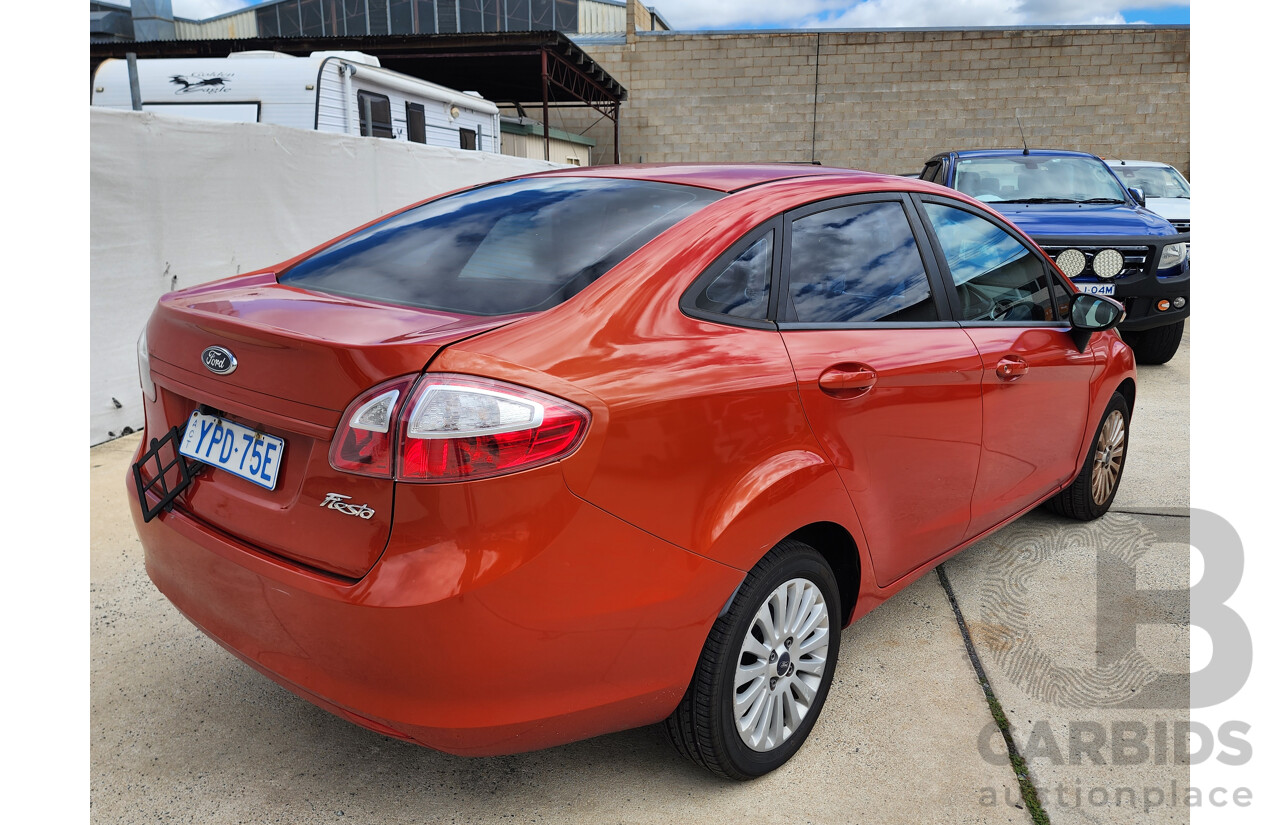 10/2010 Ford Fiesta LX WT 4d Sedan Orange 1.6L