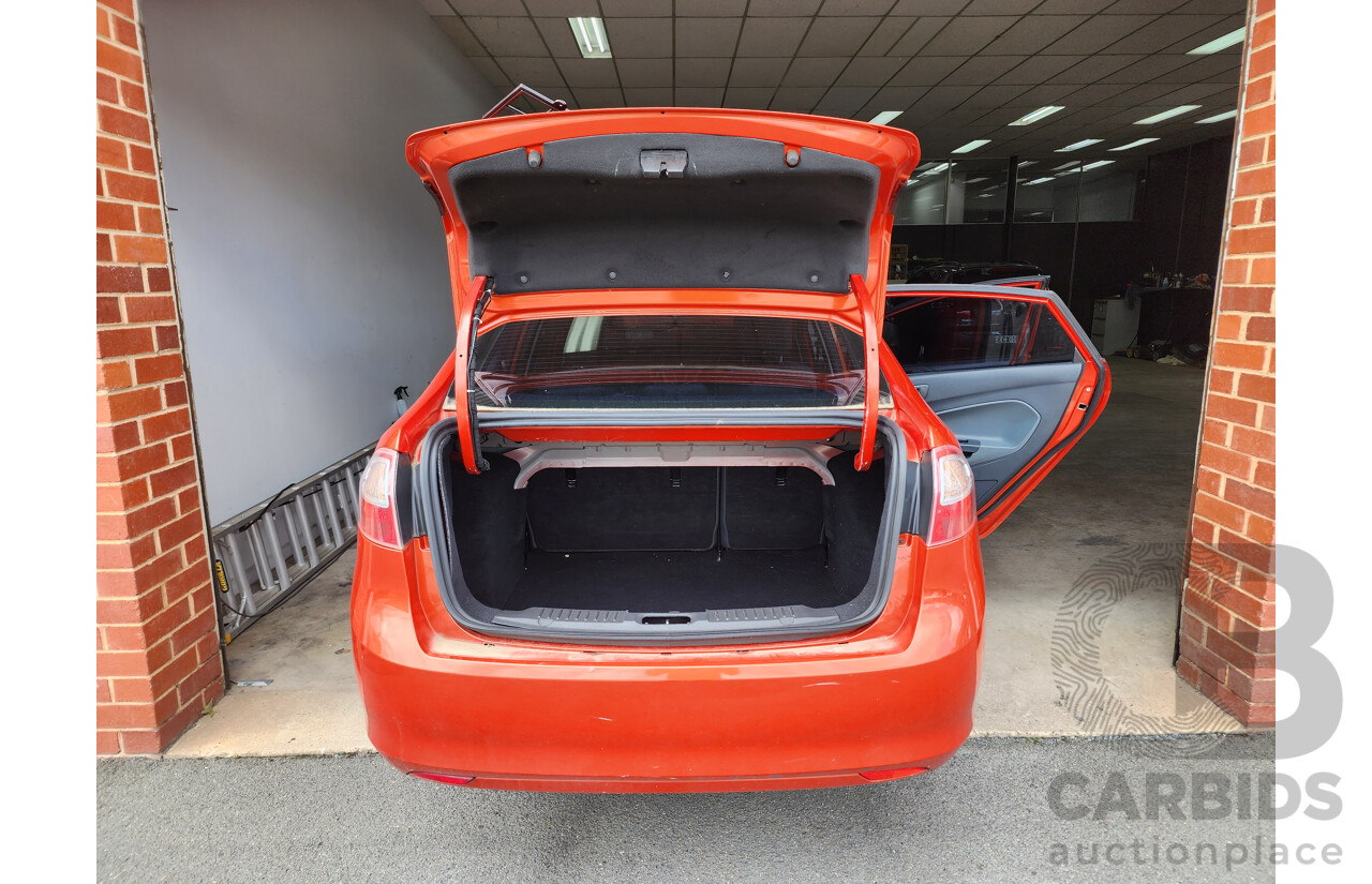 10/2010 Ford Fiesta LX WT 4d Sedan Orange 1.6L