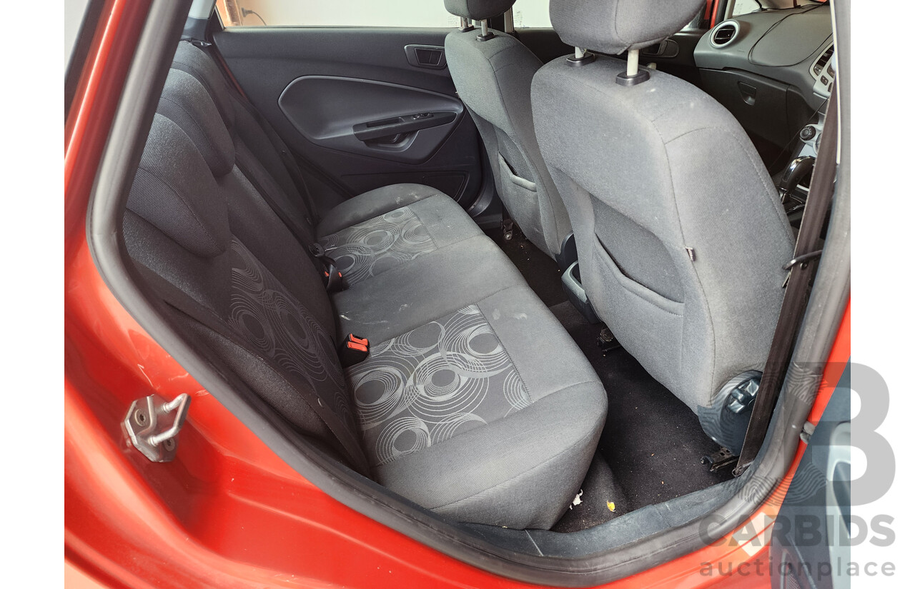 10/2010 Ford Fiesta LX WT 4d Sedan Orange 1.6L