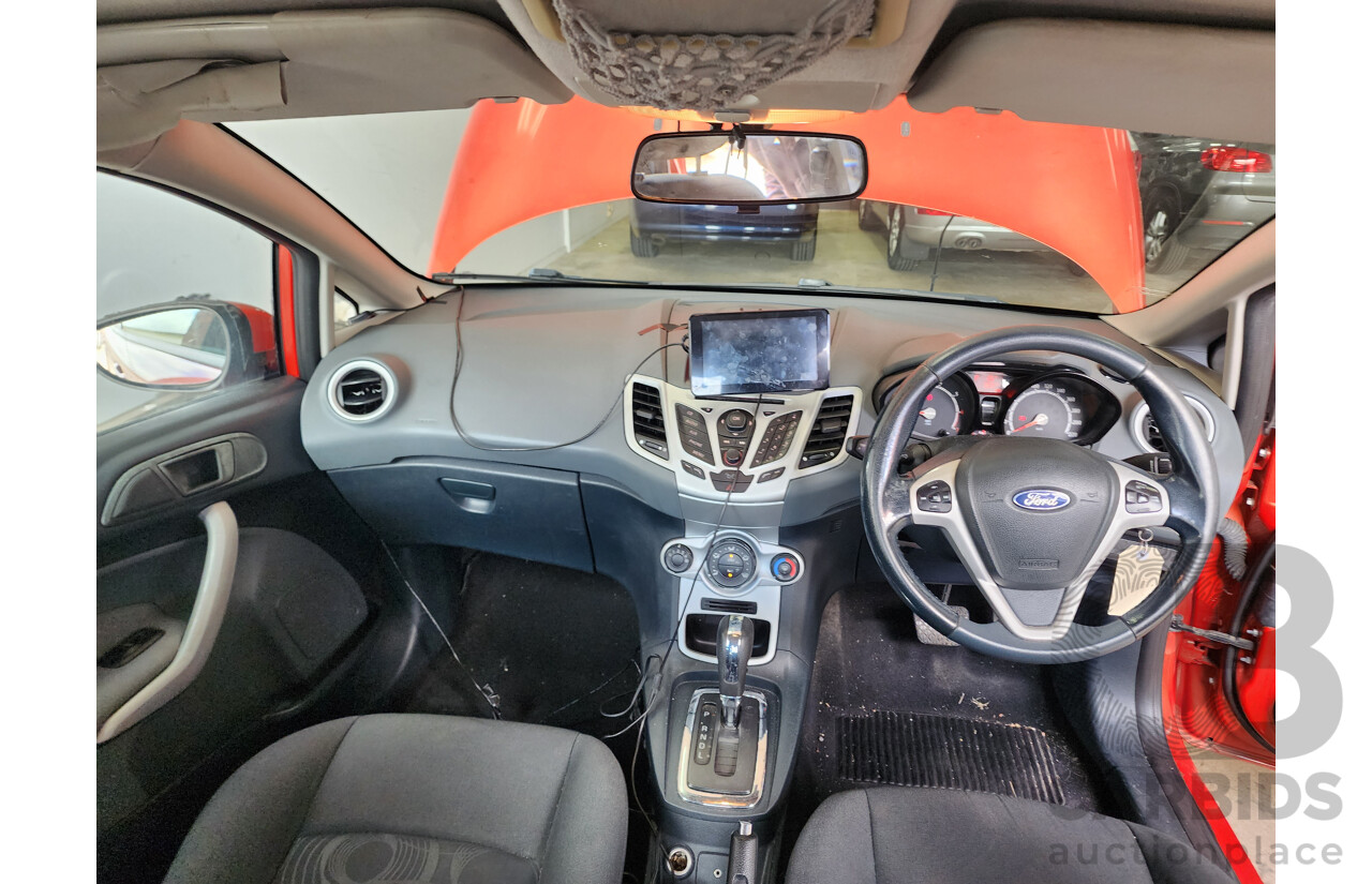 10/2010 Ford Fiesta LX WT 4d Sedan Orange 1.6L