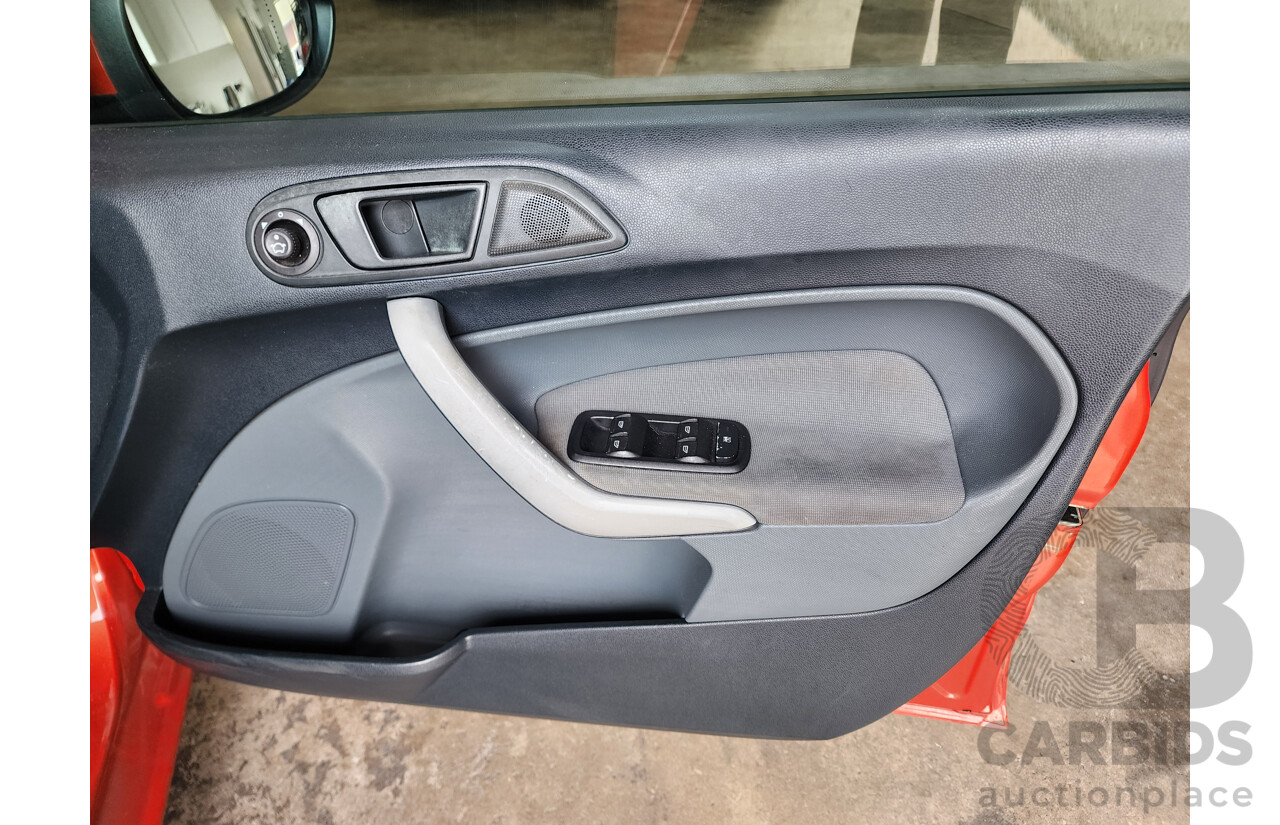 10/2010 Ford Fiesta LX WT 4d Sedan Orange 1.6L