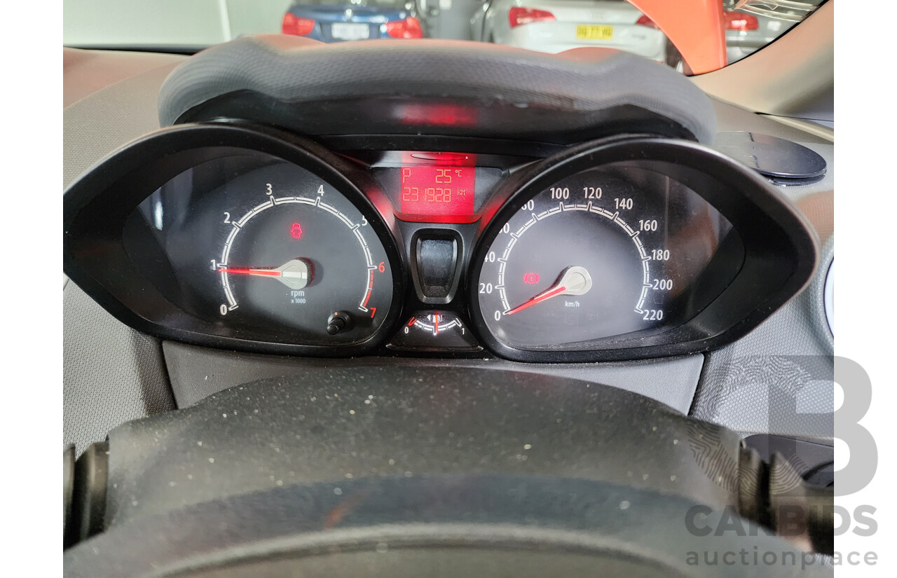 10/2010 Ford Fiesta LX WT 4d Sedan Orange 1.6L