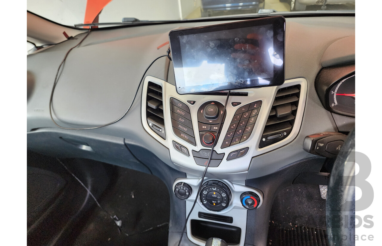 10/2010 Ford Fiesta LX WT 4d Sedan Orange 1.6L