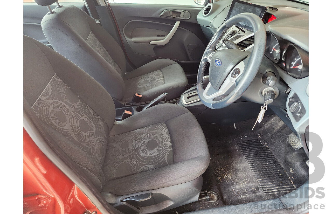 10/2010 Ford Fiesta LX WT 4d Sedan Orange 1.6L