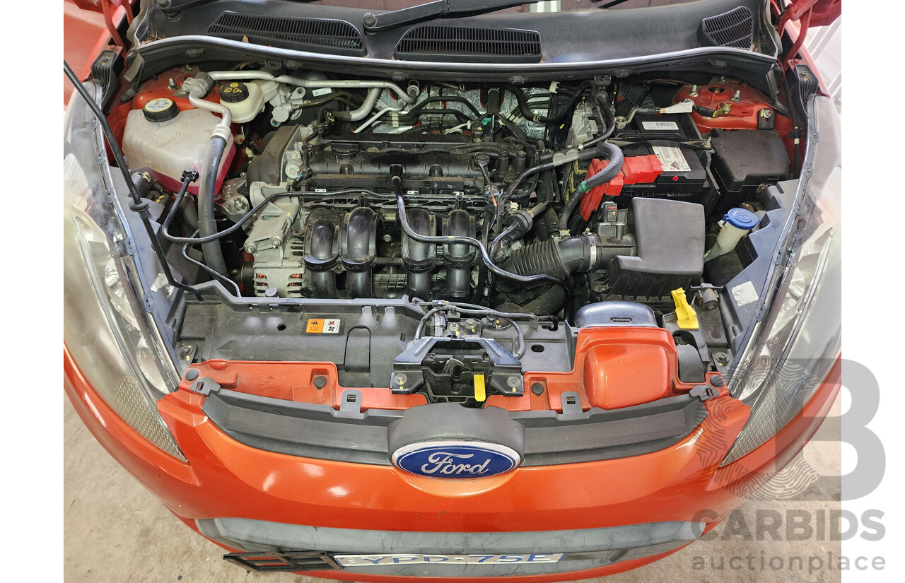 10/2010 Ford Fiesta LX WT 4d Sedan Orange 1.6L