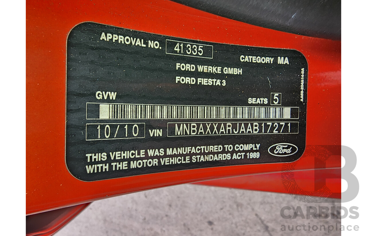 10/2010 Ford Fiesta LX WT 4d Sedan Orange 1.6L