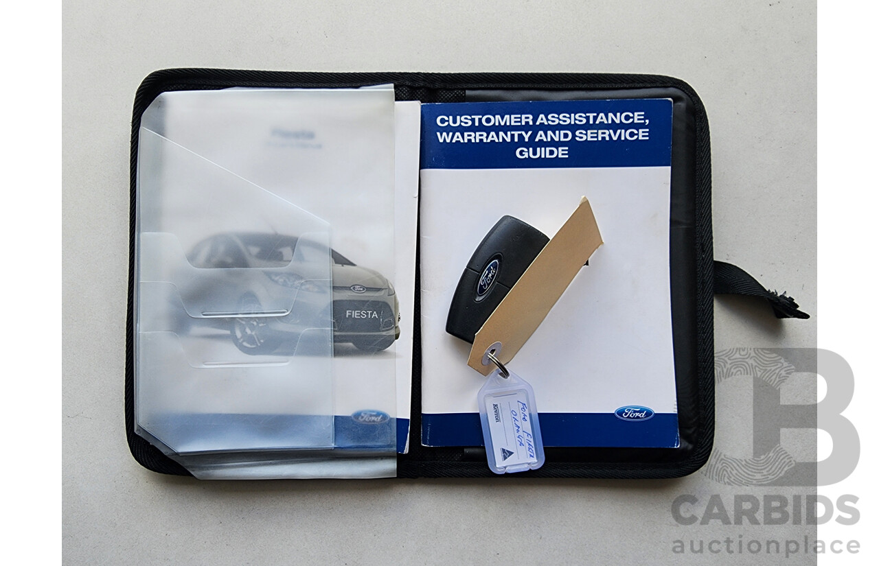 10/2010 Ford Fiesta LX WT 4d Sedan Orange 1.6L