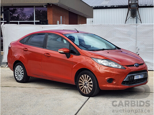 10/2010 Ford Fiesta LX WT 4d Sedan Orange 1.6L