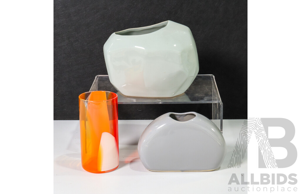 Collection of Three Vases: Two Handcrafted Clay Pieces and One Glass Vase