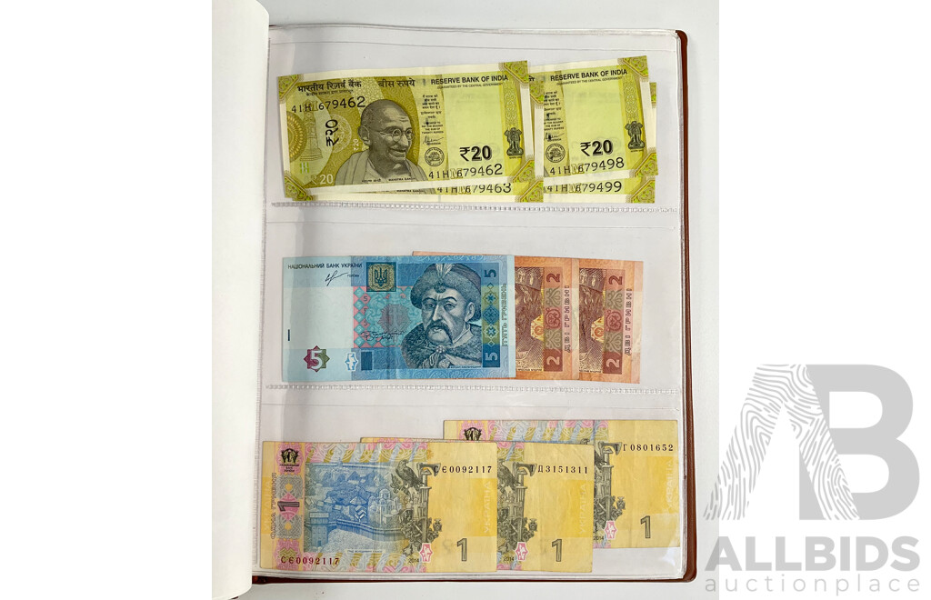Album of International Banknotes Including Consecutive India Twenty Rupees, Three Consecutive Cambodia One Thousand Riels, Two Consecutive Philippines Twenty Pisos, Australian 1985 Two Dollar, Vintage China, Netherlands.........
