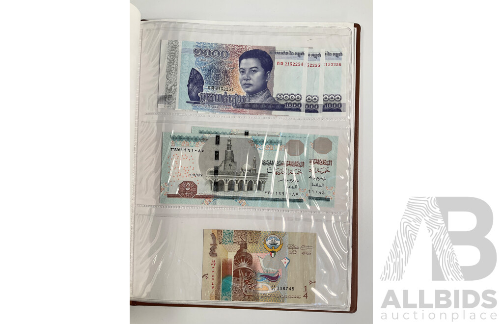 Album of International Banknotes Including Consecutive India Twenty Rupees, Three Consecutive Cambodia One Thousand Riels, Two Consecutive Philippines Twenty Pisos, Australian 1985 Two Dollar, Vintage China, Netherlands.........