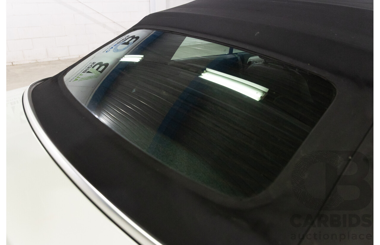 1/2012 Volkswagen Golf 118 TSI 1C 2d Cabriolet Pure White Twincharged 1.4L