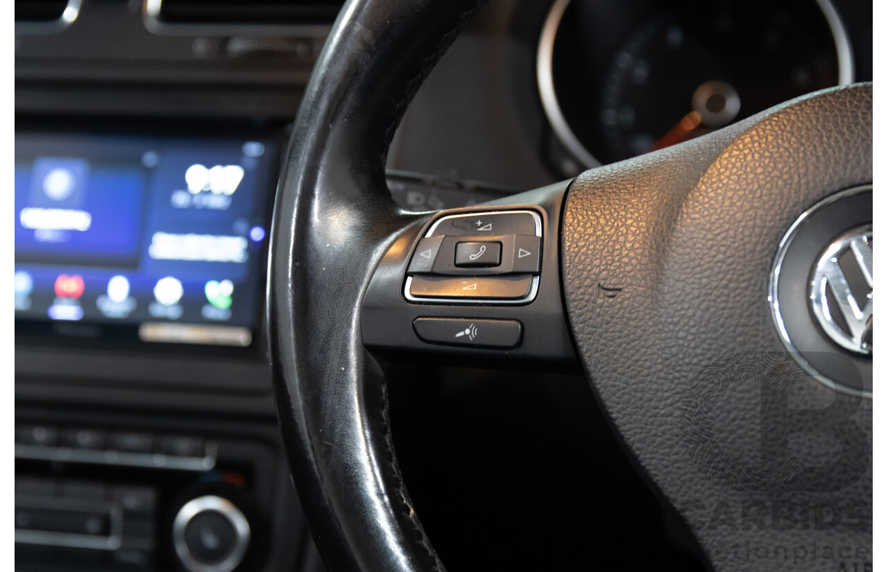 1/2012 Volkswagen Golf 118 TSI 1C 2d Cabriolet Pure White Twincharged 1.4L