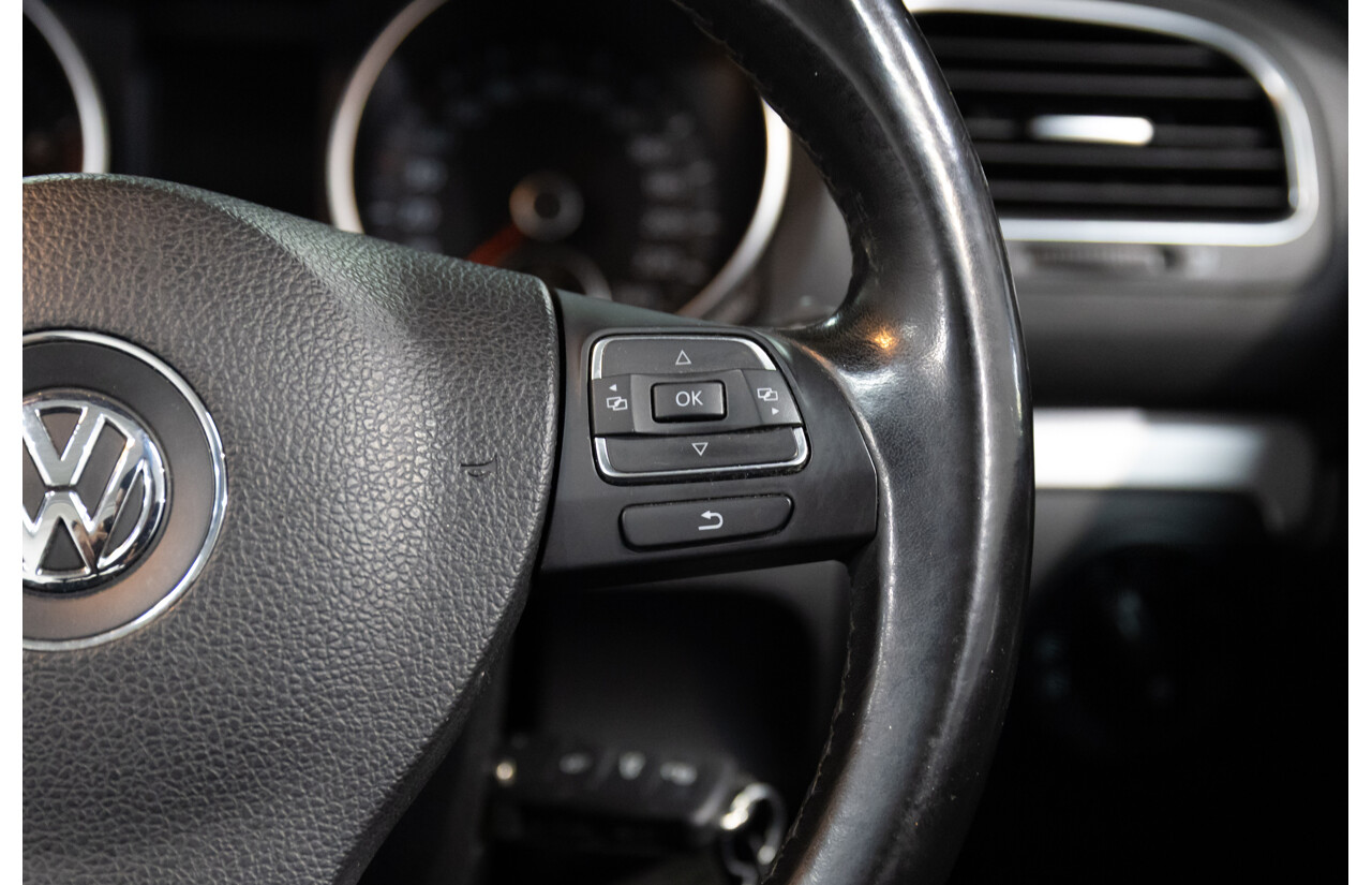 1/2012 Volkswagen Golf 118 TSI 1C 2d Cabriolet Pure White Twincharged 1.4L