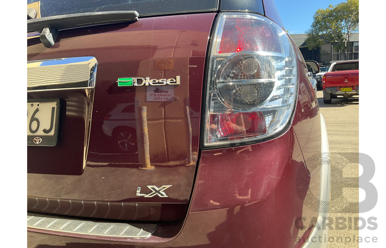 1/2013 Holden Captiva 7 LX (4x4) CG MY13 4d Wagon Maroon Turbo Diesel 2.2L - 7 Seater