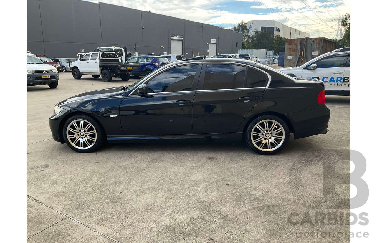 3/2010 BMW 323i E90 MY09 4d Sedan Black Sapphire Metallic 2.5L