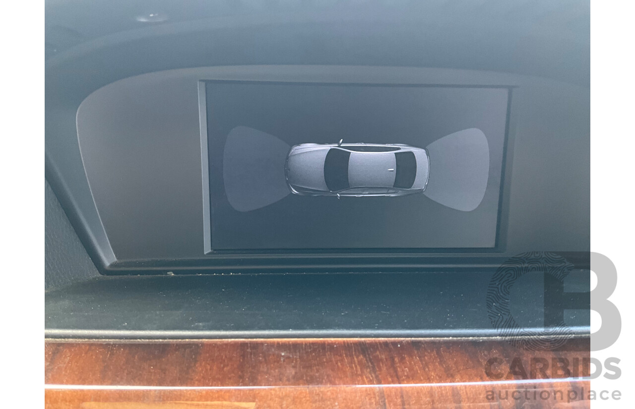 3/2010 BMW 323i E90 MY09 4d Sedan Black Sapphire Metallic 2.5L