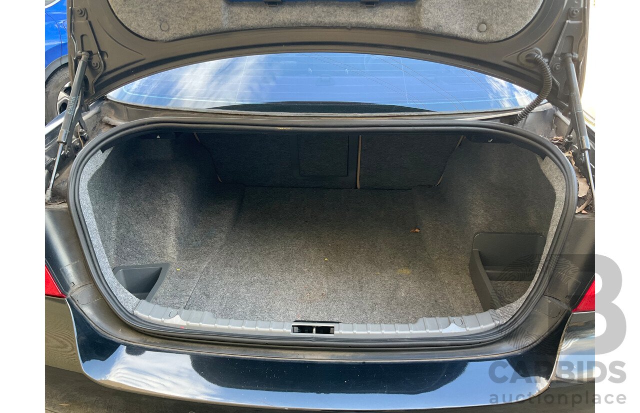 3/2010 BMW 323i E90 MY09 4d Sedan Black Sapphire Metallic 2.5L