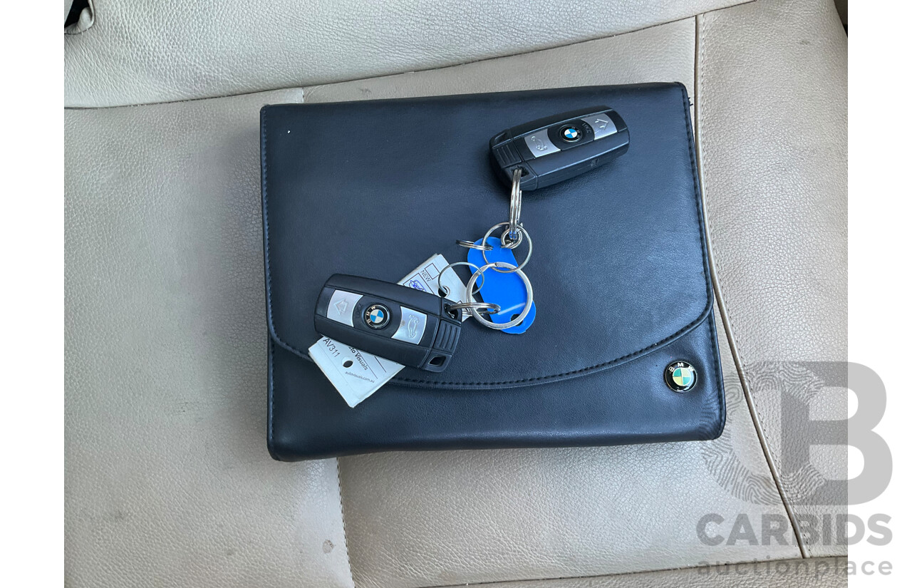 3/2010 BMW 323i E90 MY09 4d Sedan Black Sapphire Metallic 2.5L