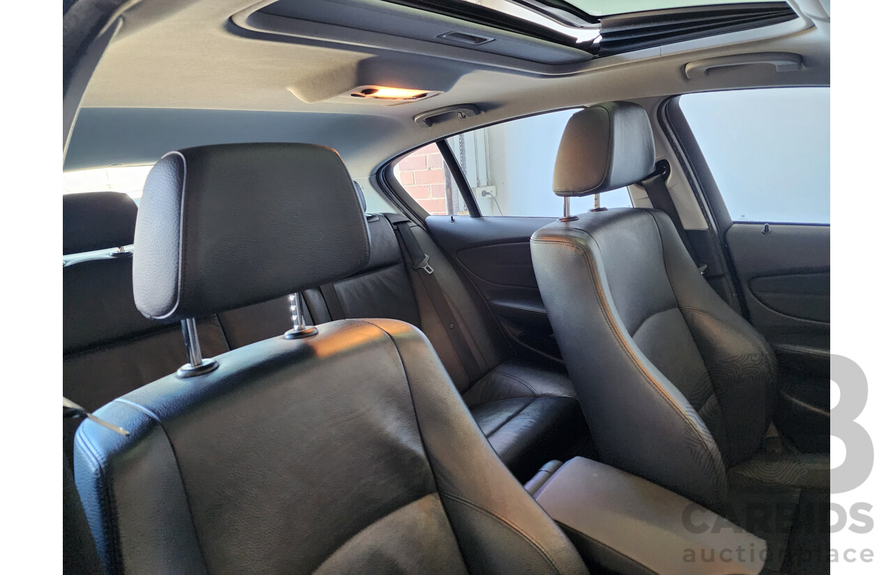 8/2011 Bmw 1 20i E87 MY11 5d Hatchback Black 2.0L