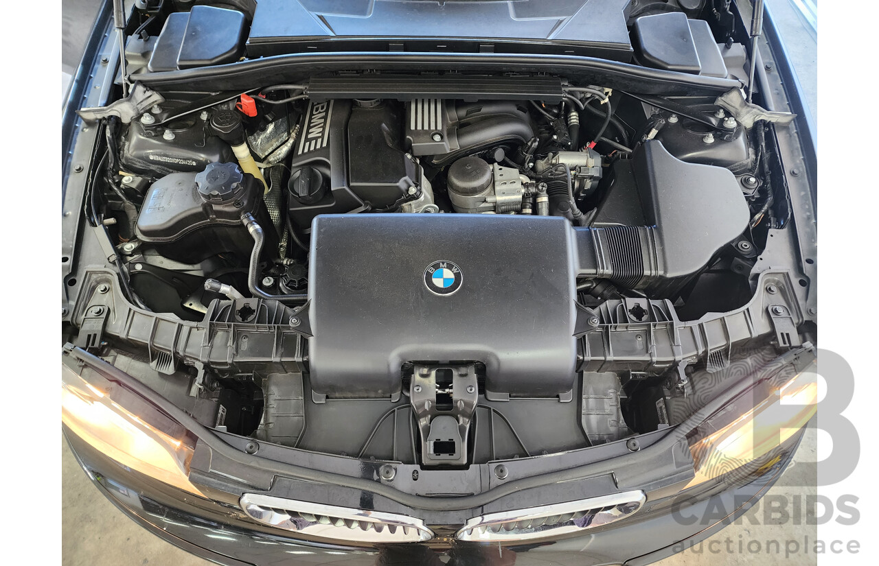 8/2011 Bmw 1 20i E87 MY11 5d Hatchback Black 2.0L