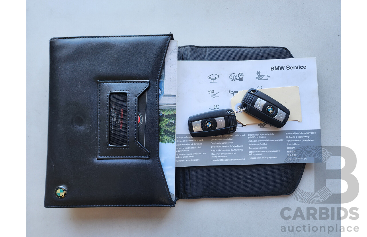 8/2011 Bmw 1 20i E87 MY11 5d Hatchback Black 2.0L