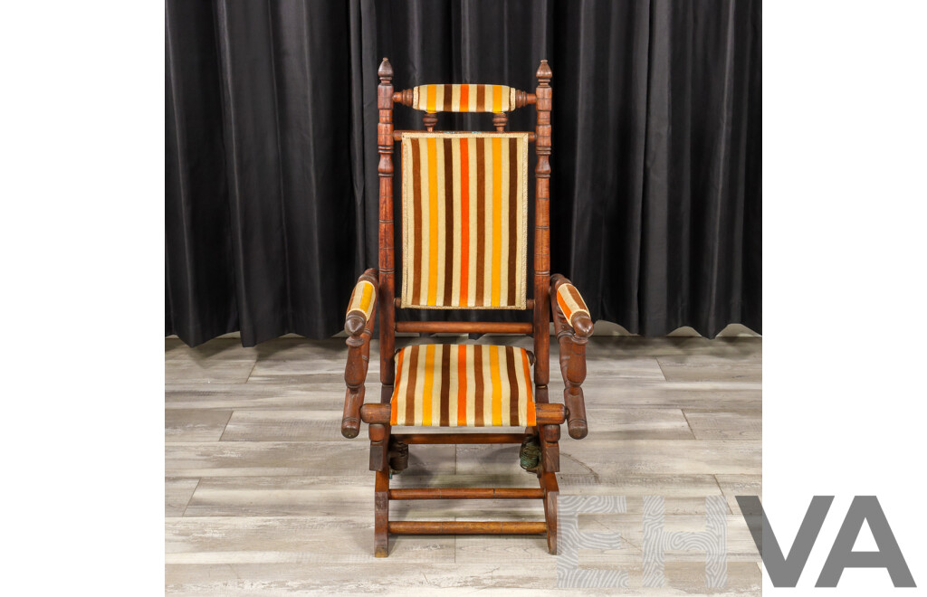 Antique Dexter Rocker with Upholstered Seat and Back