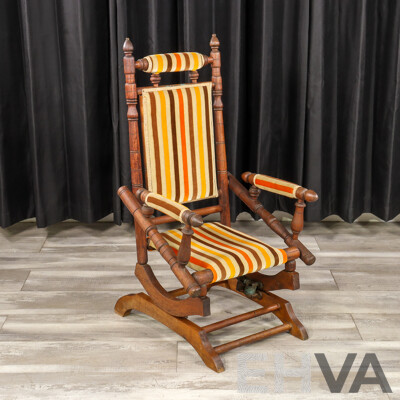 Antique Dexter Rocker with Upholstered Seat and Back