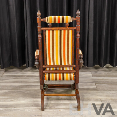 Antique Dexter Rocker with Upholstered Seat and Back