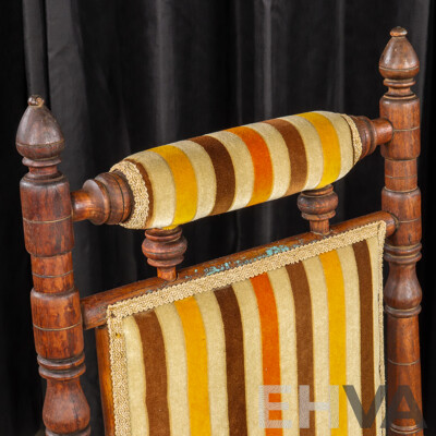 Antique Dexter Rocker with Upholstered Seat and Back