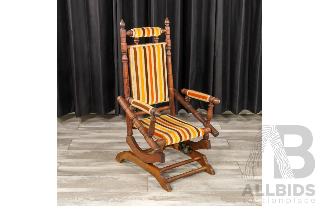 Antique Dexter Rocker with Upholstered Seat and Back