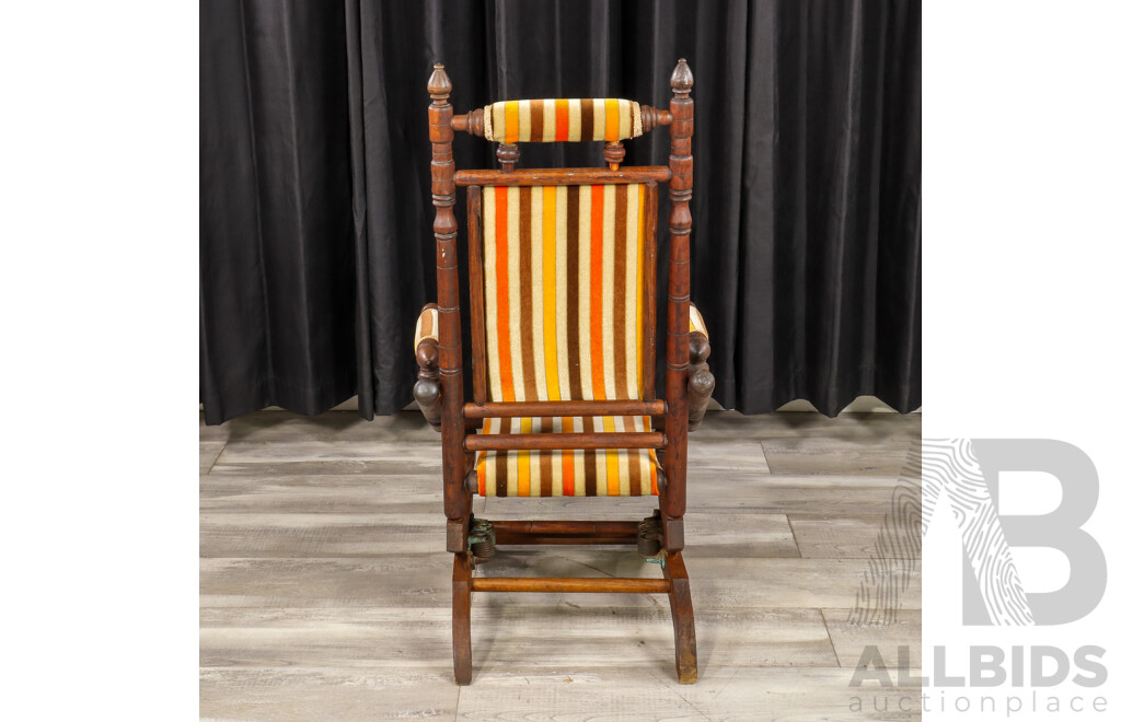 Antique Dexter Rocker with Upholstered Seat and Back