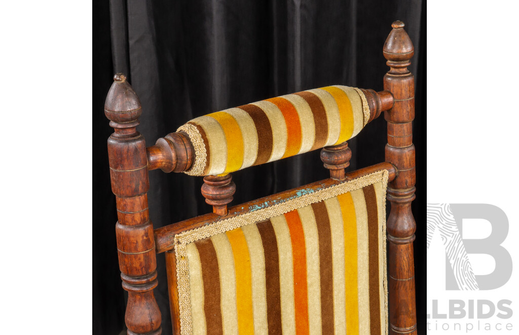 Antique Dexter Rocker with Upholstered Seat and Back