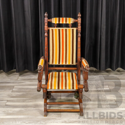 Antique Dexter Rocker with Upholstered Seat and Back