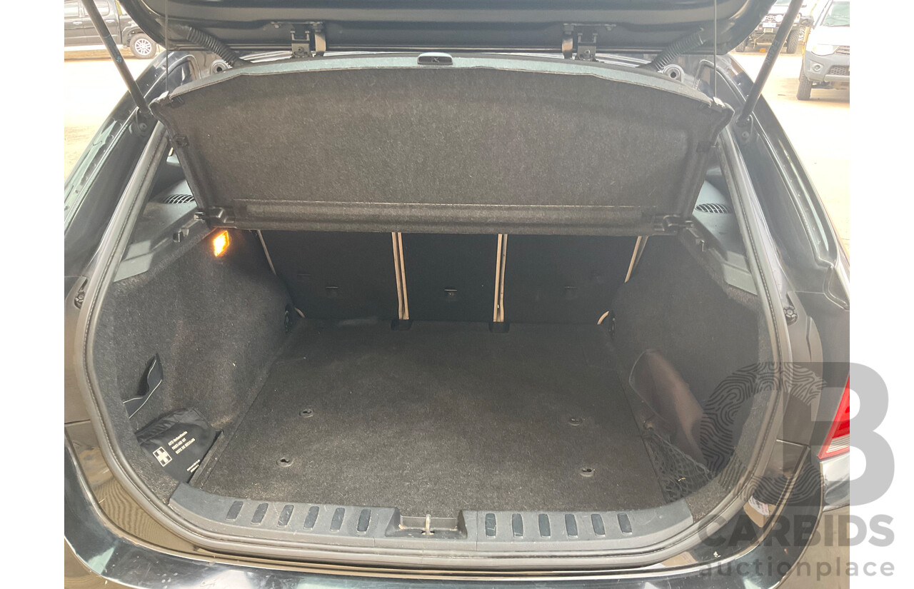 3/2011 Bmw X1 Xdrive 20d E84 MY11 4d Wagon Black 2.0L