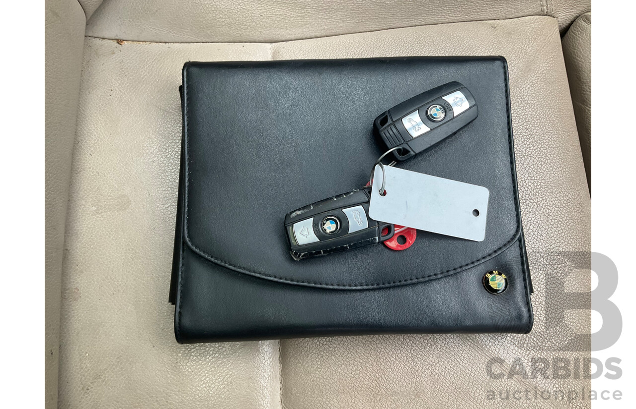 3/2011 Bmw X1 Xdrive 20d E84 MY11 4d Wagon Black 2.0L