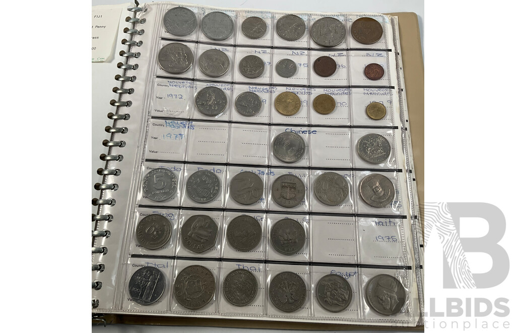 Album of International Vintage Coins Including USA, Fiji, New Zealand, Canada, Germany, Hong Kong, India, Malaysia, Tonga and More